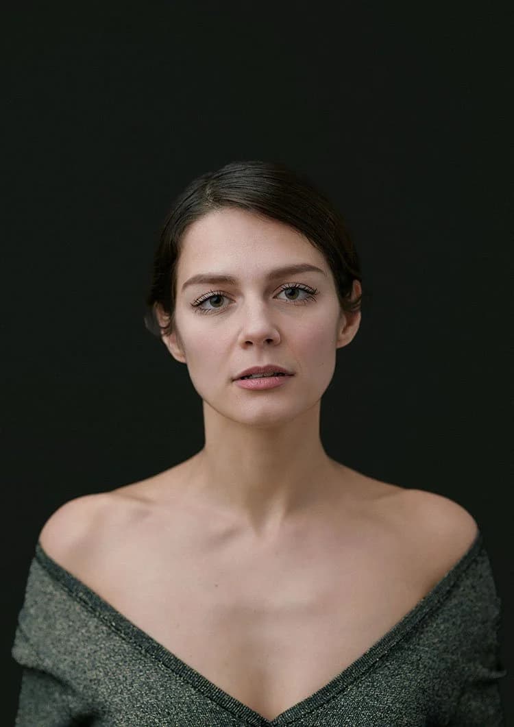 Natural actor headshot portrait of Lora in London studio with dark backdrop